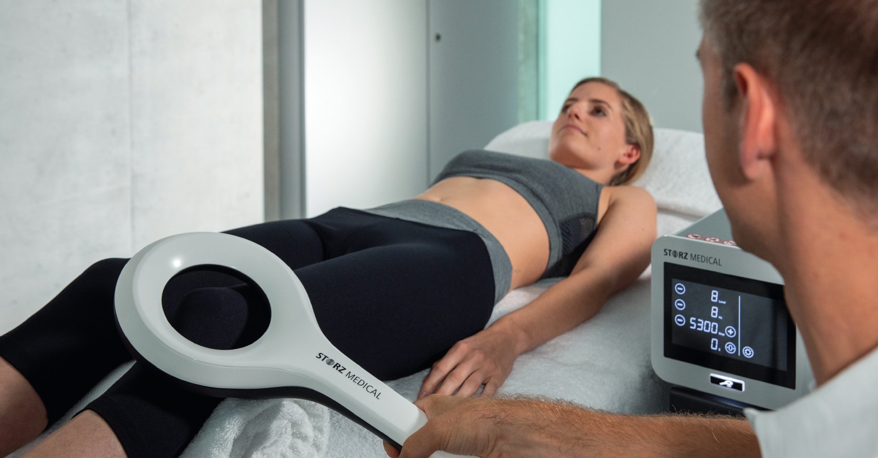 EMTT treatment: the applicator is held over the painful area